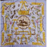 Hermes, Paris:  An attractive silk Scarf, with horse and jockey in centre, approx. 33" x 33". (1)