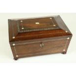 An attractive Victorian rosewood sarcophagus shaped Jewellery Box, with beaded top and mother-o-