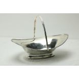 A good English George III bright cut silver Fruit Basket, with swing handle and oval base, by Hester