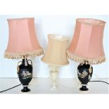 A good pair of Grecian style porcelain black ground vase shaped Table Lamps, each with two leaf