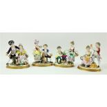 A set of four attractive late 19th Century  Sitzendorf hand painted Figural Statues, depicting