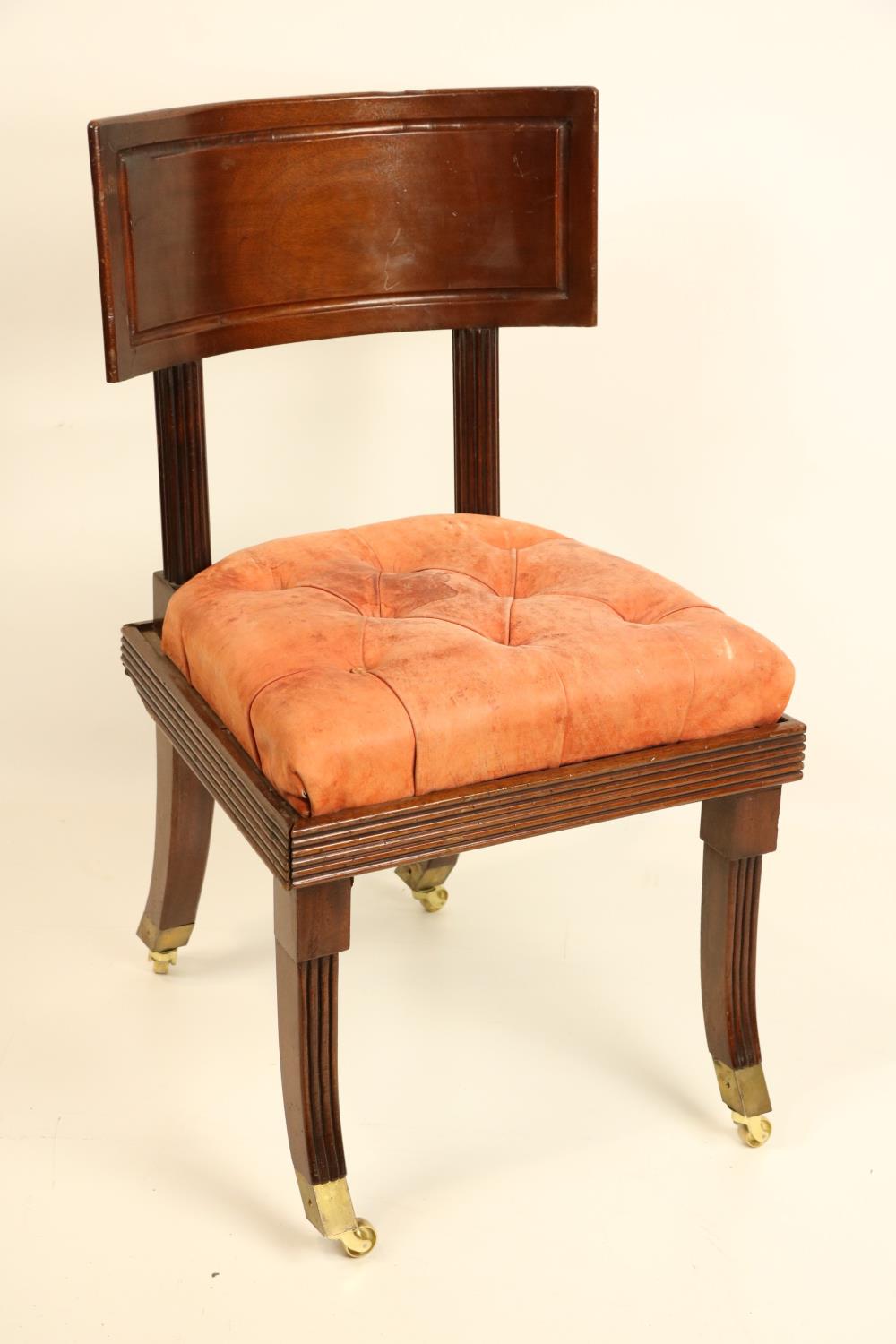 A late Regency period mahogany "Klismos" Side Chair, probably Irish, with deep curved panel back