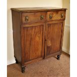 A William IV period mahogany Linen Cupboard, with moulded top and two frieze drawers, above two