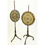 Two - 19th Century mahogany Polescreens, one with oval tapestry panel, the other with a circular