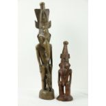 A 19th Century carved wooden Figure, "Kandimbong," Papua New Guinea, depicted as a "Birdman" with