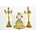 A fine 19th Century French ormolu and porcelain mounted three piece Mantle Clock Garniture, by