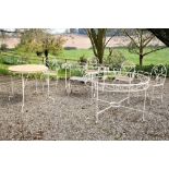 A set of 4 wrought iron Garden or Patio Garden Armchairs, with slatted wooden seats, together with