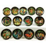 A set of 13 Russian "Fairytale" Plates, each on blackened background with ornate colourful designs