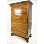 A George III period mahogany Chest on Chest, the Greek key moulded cornice above a blind fret frieze