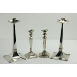 A pair of Arts & Crafts silver Candlesticks, by James Dixon & Sons, Sheffield 1898, each with square