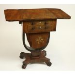 A William IV period mahogany Ladies Work Table, with two D shaped flaps flanking two frieze