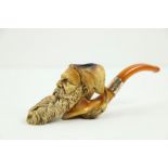A 19th Century Meerschaum Pipe, modelled as a bearded Gentleman with a fez hat, with an amber
