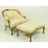 A 19th Century French gilt Duchess Brisée , comprising of Armchair and matching Stool covered in