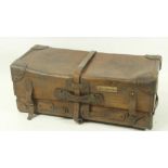 A very heavy late 19th Century leather Travelling Trunk, with reinforced corners and multiple straps