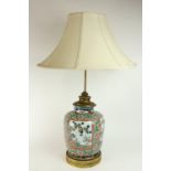 An attractive 19th Century Famille Verte ormolu mounted porcelain Jar, converted to Lamp, with cream