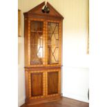 A very attractive pair of George III style mahogany marquetry inlaid Corner Display Cabinets, the