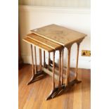 A nest of three rectangular walnut Occasional Tables, on turned supports, the largest 20" (