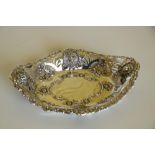 An attractive pierced and embossed oval silver  Bon Bon Dish, decorated with lion masks, and