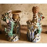 A pair of Chinese polychrome Earthenware Jardinière Stands, damaged, each in the form of a Fo