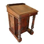 A fine quality William IV Irish mahogany Davenport, in the manner of Williams & Gibton, with three-