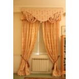 Two pairs of lined salmon coloured Curtains, 274cms drop x 183cms wide (9' x 6'), with attractive