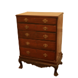 An Irish mahogany Chest, 18th Century and later, with five graduating drawers on shell and