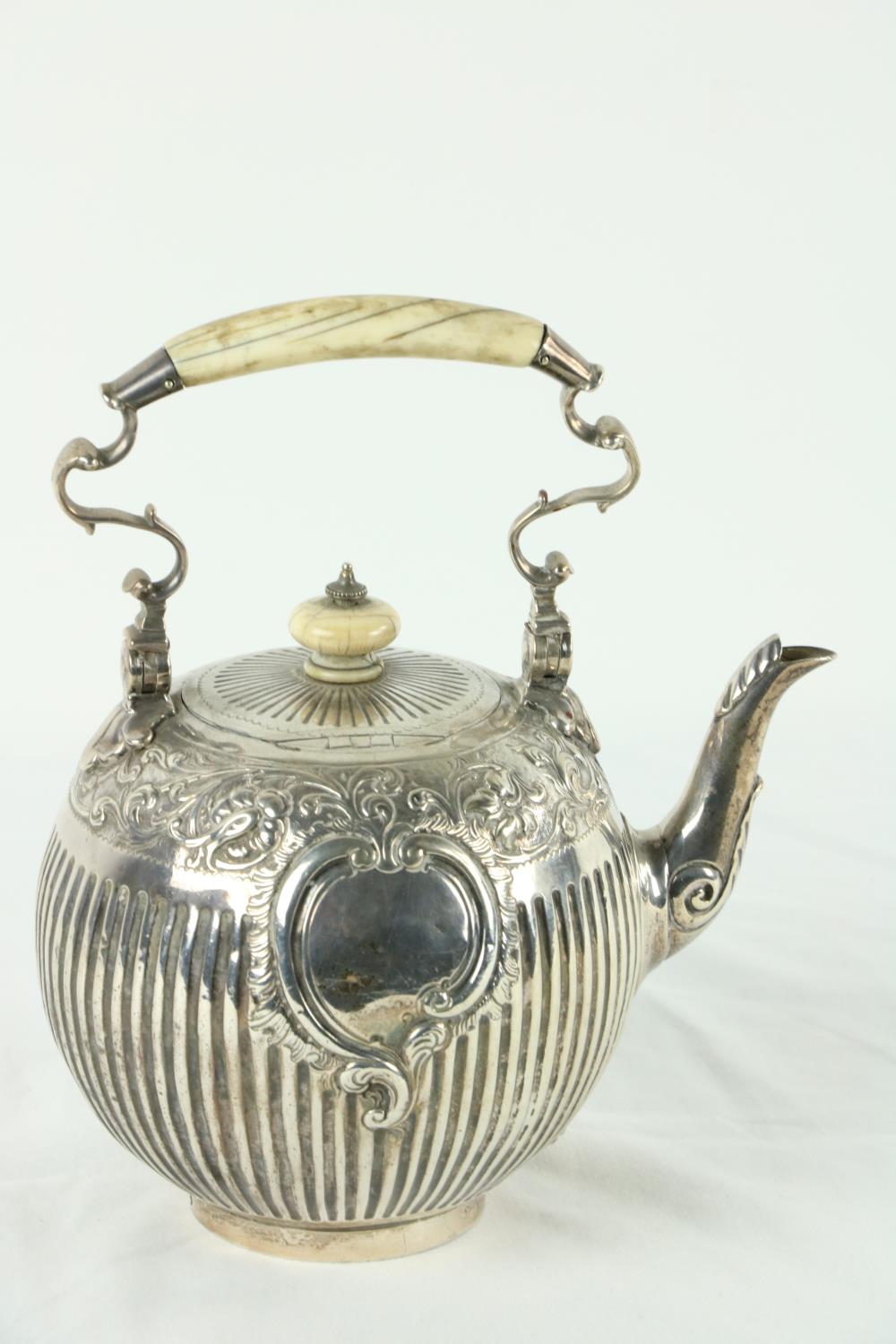 A Victorian silver half fluted Tea Kettle, of bulbous form with ivory handle and finial chased - Image 6 of 6