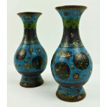 A pair of fine quality mid-19th Century Japanese cloisonné Vases, of bulbous design, decorated on