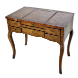 An early 19th Century French walnut and marquetry Coiffeuse, (Dressing Table), with centre pop up