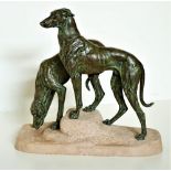 Jules Edmond Masson (1871 - 1932) A large Study of Two Greyhounds, bronzed art metal, on cut stone