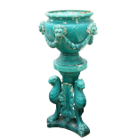 A pair of very large turquoise coloured glazed porcelain matching Urns and Stands, the urns with