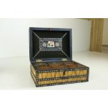 An attractive early 19th Century quill and ivory inlaid Curiosity Box, the hinged top opening to