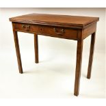 A 19th Century Irish mahogany fold-over Tea Table, with frieze drawer and brass handles, on square