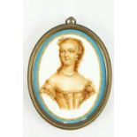 An oval Sevres style French porcelain Miniature of a Lady, half length with necklace in gilt brass