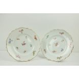 A pair of attractive 19th Century Meissen white ground floral decorated Plates, with gilt tipped