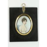 Attributed to Frederick Buck (1771 - 1839)Half length miniature Portrait of a Young Lady wearing a