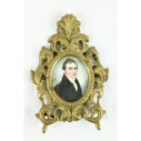 Frederick Buck (1771 - 1839)Half length oval "Portrait of a Gentleman wearing a black jacket and