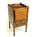 A George III tray top mahogany Bedside Commode, with shaped gallery and cupboard door and two mock