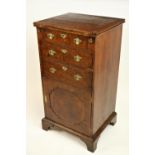 A very unusual crossbanded and figured walnut Chest Cupboard, mid-18th Century, with herring-bone