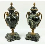 A pair of late 19th Century green veined marble Mantlepiece Urns, with gilt metal mounts and