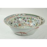 An attractive 19th Century Cantonese Bowl, the decorative rim designed in panels, the interior