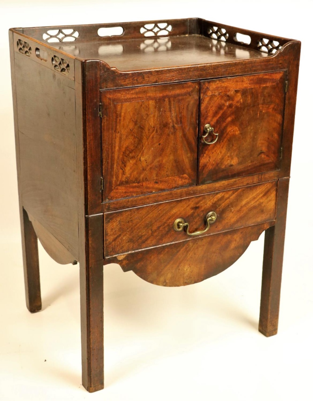 A George III period mahogany tray top Bedside Cupboard, with three-quarter chinoiserie pierced