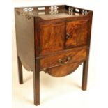 A George III period mahogany tray top Bedside Cupboard, with three-quarter chinoiserie pierced