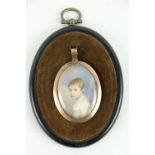 Early 19th Century English SchoolAn oval miniature "Child wearing a white dress, sky in background,"