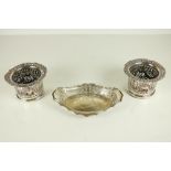 A pair of fine quality late 19th Century silver plated Bottle Coasters, decorated in the Adams