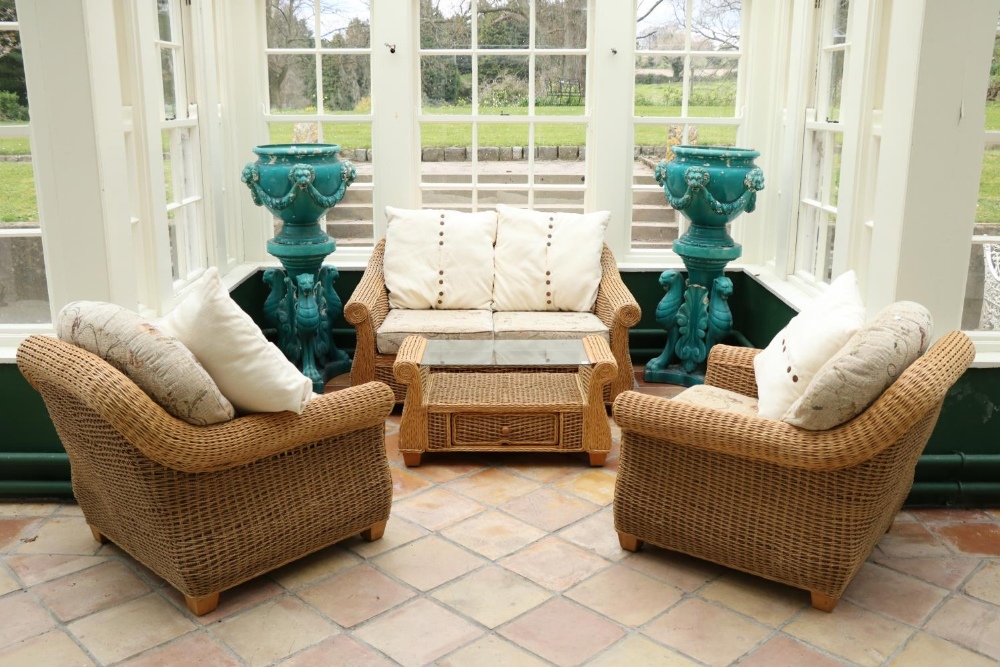 An attractive 8 piece cane work Conservatory Suite, consisting of a two seater settee, two