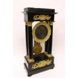 An attractive 19th Century ebonised and gilt decorated Pillar Clock, with circular silvered dial