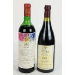 1970 Mouton Rothschild, 1 bottle; and a 2001 Cote Rotie, 1 bottle. (2)