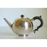 A fine quality and rare Irish Georgian (George II period) silver bullet Teapot, the hinged