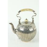 A Victorian silver half fluted Tea Kettle, of bulbous form with ivory handle and finial chased